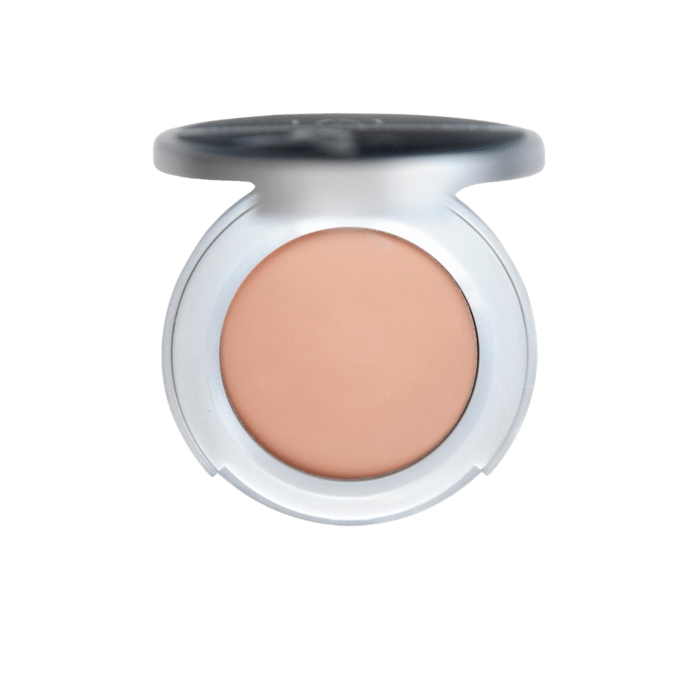 Sand Castle' All-Over Brightening Concealer from Dr. Berrettini's Mendocino Minerals, medium-dark with warm beige undertones, displayed in a glass bottom container.