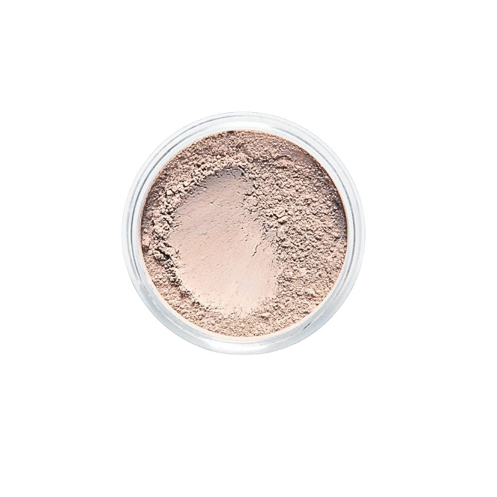Top-down view of Dr. Berrettini's Mendocino Minerals 'Sheerly Flawless Foundation - Golden Light' in a round container, featuring a golden hue with warm undertones and a distinct indentation, ideal for light-medium skin tones.