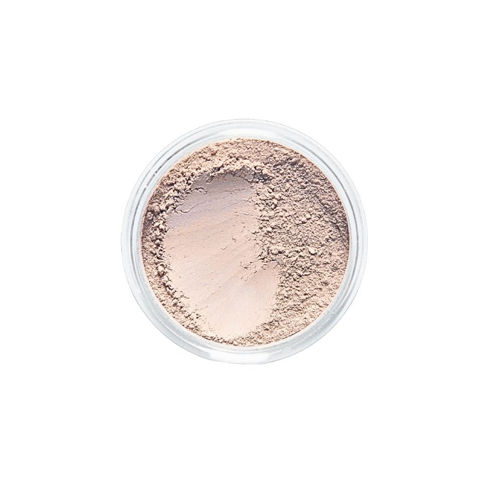 Top-down view of Dr. Berrettini's Mendocino Minerals 'Sheerly Flawless Foundation - Sand Dollar' in a round container, featuring a neutral beige tone with balanced undertones and a distinct indentation, ideal for light to light-medium skin tones.